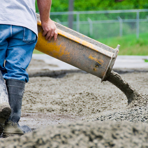 Stock Image - Man pumping conrete